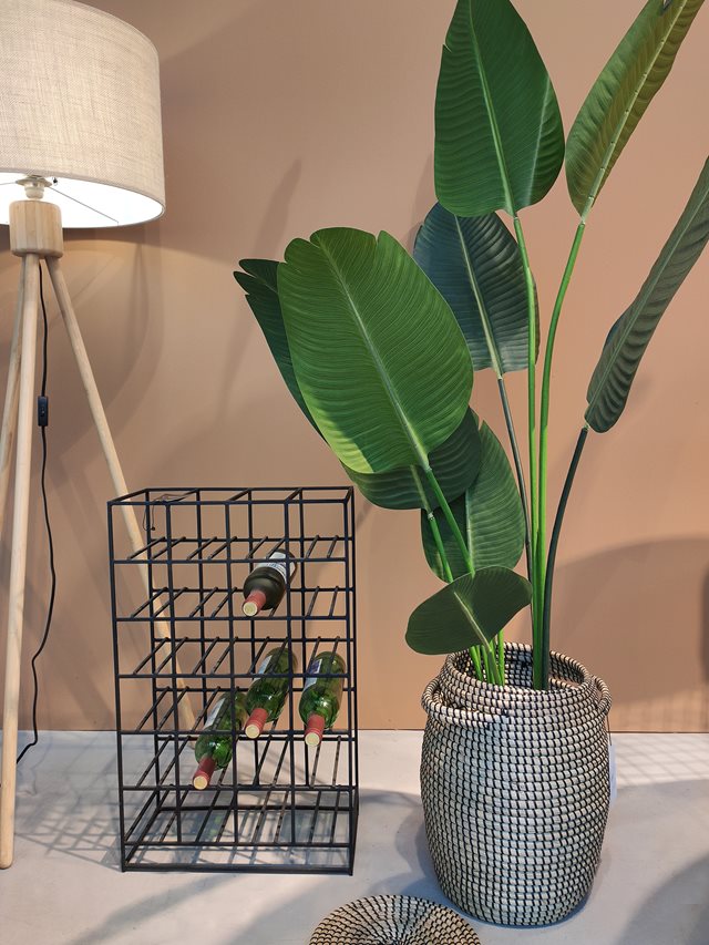 Kerstboom eruit, kunstplant erin